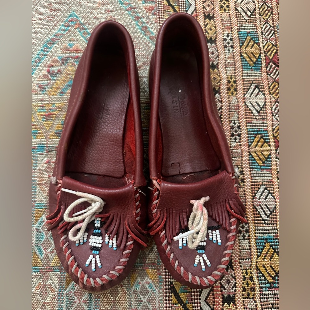 Minnetonka moccasins in burgundy size 9.5